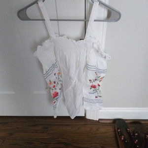 Off the shoulder shirt with embroidered flowers